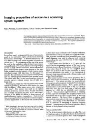 Imaging properties of axicon in a scanning optical system