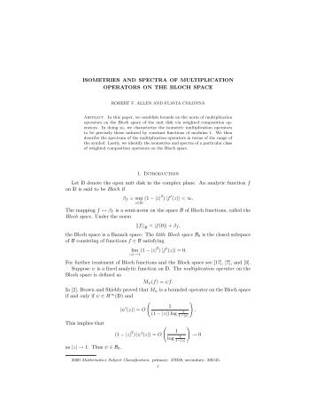 Isometries and spectra of multiplication operators on the Bloch space