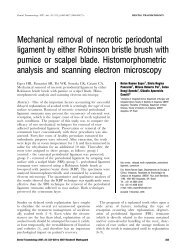 Mechanical removal of necrotic periodontal ligament by either ...