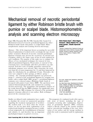 Mechanical removal of necrotic periodontal ligament by either ...
