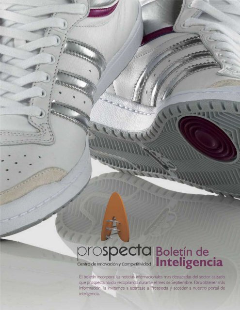 Foto de zapatillas blancas para niños fotografía macro de zapatillas  deportivas hechas de cuero y tela con