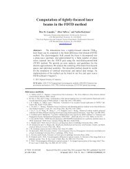 Computation of tightly-focused laser beams in the FDTD method