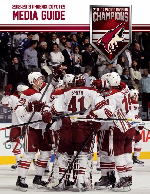 Phoenix Coyotes center Kevyn Adams (14) and Dallas Stars center