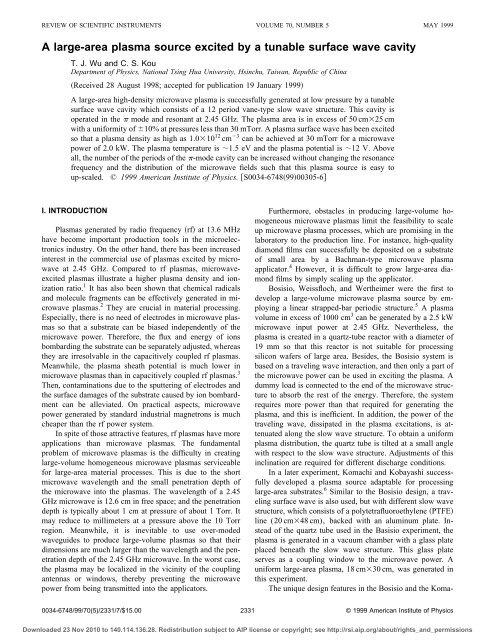 A large-area plasma source excited by a tunable surface wave cavity