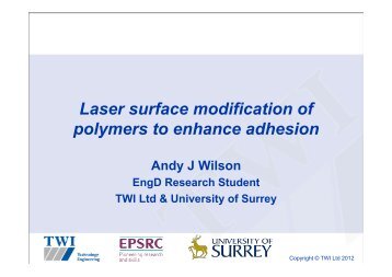 Laser surface modification of polymers to enhance adhesion