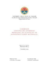 Combined continuum/atomistic modeling of elasticity in ...