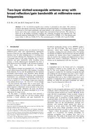 Two-layer slotted-waveguide antenna array with broad reflection ...