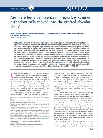 Are there bone dehiscences in maxillary canines orthodontically moved into the grafted alveolar cleft_