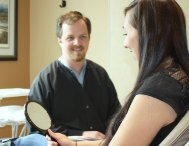 Wasilla dentist Dr. Jonathan Oudin explaining cosmetic dentistry options to patient at Alaska Center for Dentistry PC