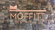 Signage on the wall at Moffitt Dental Center