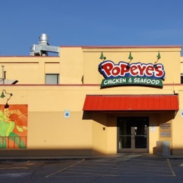 Popeyes Louisiana Kitchen 5 minutes walk to the southeast of Anchorage's best dental implant specialist Anchorage Midtown Dental Center