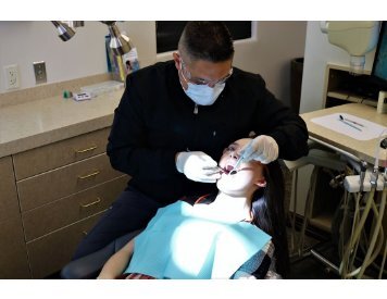 Tempe dentist Dr. Sobieraj performing root canal procedure at Beautiful Dentistry