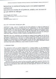 Interactions in reinforced bearing layers over partial supported ...